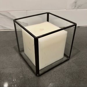 Glass votive and candle